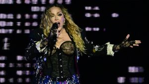 TOPSHOT - US pop star Madonna performs onstage during a free concert at Copacabana beach in Rio de Janeiro, Brazil, on May 4, 2024. . Madonna ended her "The Celebration Tour" with a performance attended by some 1.5 million enthusiastic fans. (Photo by Pablo PORCIUNCULA / AFP) (Photo by PABLO PORCIUNCULA/AFP via Getty Images)