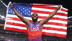 PARIS, FRANCE - AUGUST 04: Noah Lyles of Team United States celebrates winning the gold medal in the Men's 100m Final on day nine of the Olympic Games Paris 2024 at Stade de France on August 04, 2024 in Paris, France. (Photo by Christian Petersen/Getty Images)