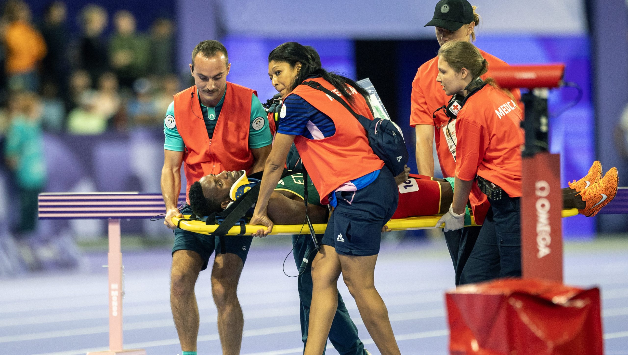 PARIS, FRANCE: AUGUST 07:  Lamecha Girma of Ethiopia is stretchered from the track after falling in the Men's 3000m Steeplechase final during the Athletics Competition at the Stade de France during the Paris 2024 Summer Olympic Games on August 7th, 2024, in Paris, France. (Photo by Tim Clayton/Corbis via Getty Images)