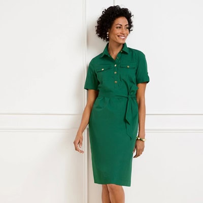 A woman in a green shirtdress