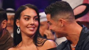 RIYADH, SAUDI ARABIA - OCTOBER 28: Cristiano Ronaldo and his wife Georgina Rodríguez speak ringside prior to the Heavyweight fight between Tyson Fury and Francis Ngannou at Boulevard Hall on October 28, 2023 in Riyadh, Saudi Arabia. (Photo by Justin Setterfield/Getty Images)