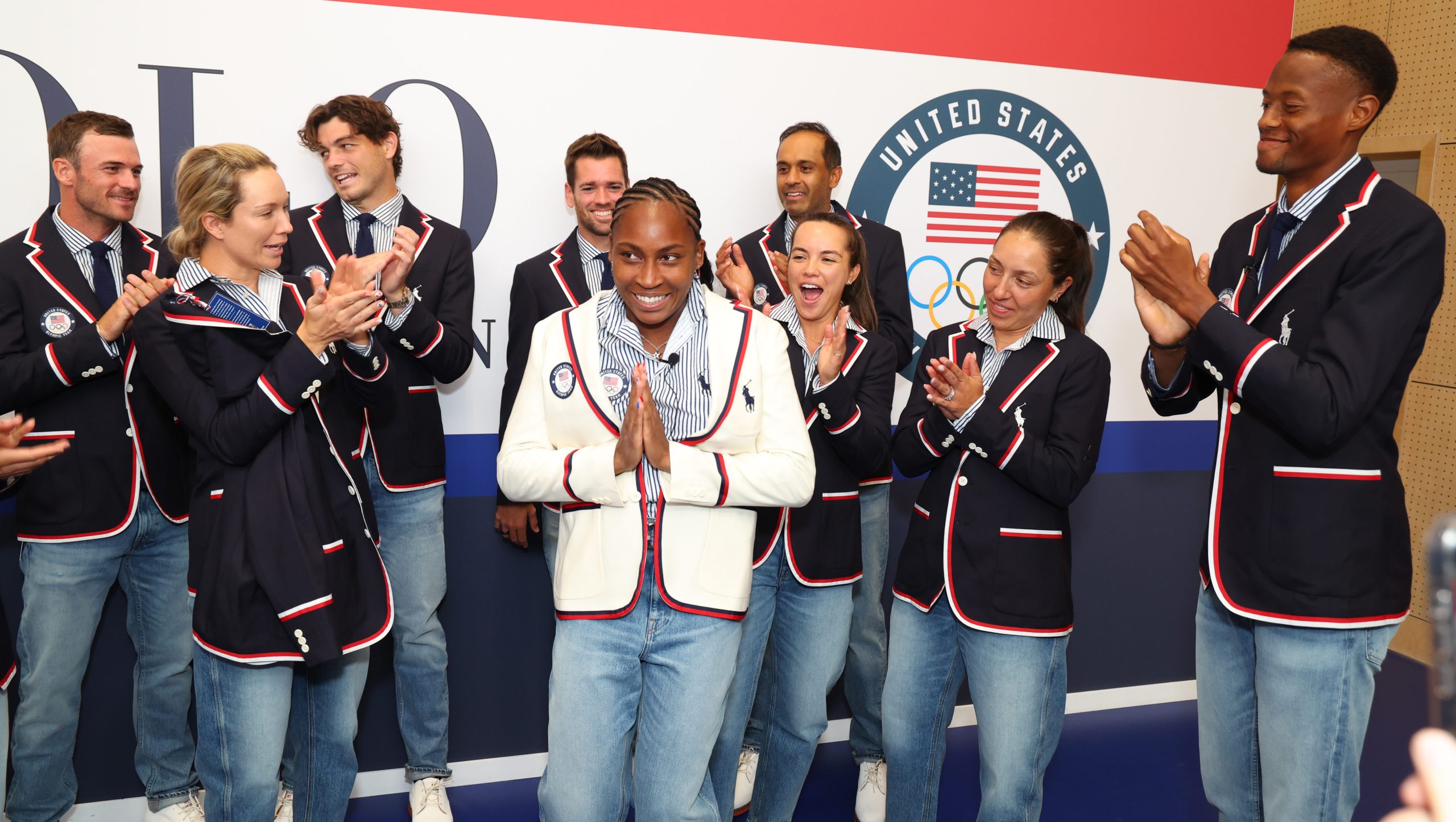 PARIS, FRANCE - JULY 23: U.S. Olympians Marcos Giron, Emma Navarro, Tommy Paul, Danielle Collins, Taylor Harry Fritz, Coco Gauff, Desirae Krajczyk, Rajeev Ram, Jessica Pegula and Christopher Eubanks celebrate the announcement of Coco Gauff as the US Flag Bearer at the Team USA Welcome Experience ahead of Paris 2024 on July 23, 2024 in Paris, France.  (Photo by Joe Scarnici/Getty Images for USOPC)