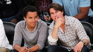 Tom Cruise and Connor Cruise at basketball game.