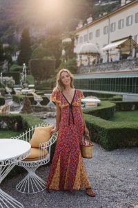 lake como italy red yellow blue floral dress