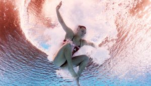 PARIS, FRANCE - AUGUST 07: (EDITORS NOTE: Image was captured using an underwater robotic camera.) Alison Gibson of Team United States competes in the Women's 3m Springboard Preliminaries on day twelve of the Olympic Games Paris 2024 at Aquatics Centre on August 07, 2024 in Paris, France. (Photo by Adam Pretty/Getty Images)