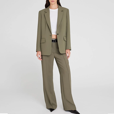 woman wears olive suit with wide leg pants and white cropped tee (know your office)