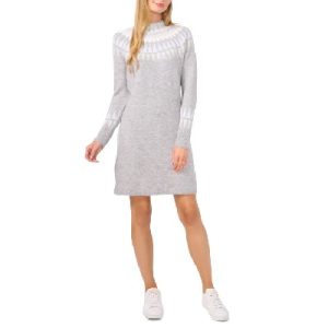 A woman wearing a gray Fair Isle sweater dress with white sneakers