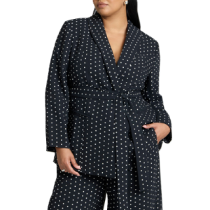 plus-size curvy model wears a polka-dot suit with a tie waist